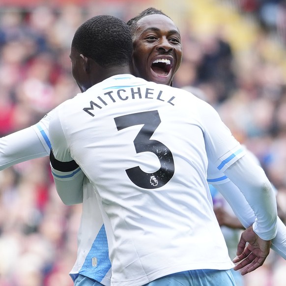 Crystal Palace&#039;s Eberechi Eze celebrates with Crystal Palace&#039;s Tyrick Mitchell after scoring his side&#039;s opening goal during the English Premier League soccer match between Liverpool and ...