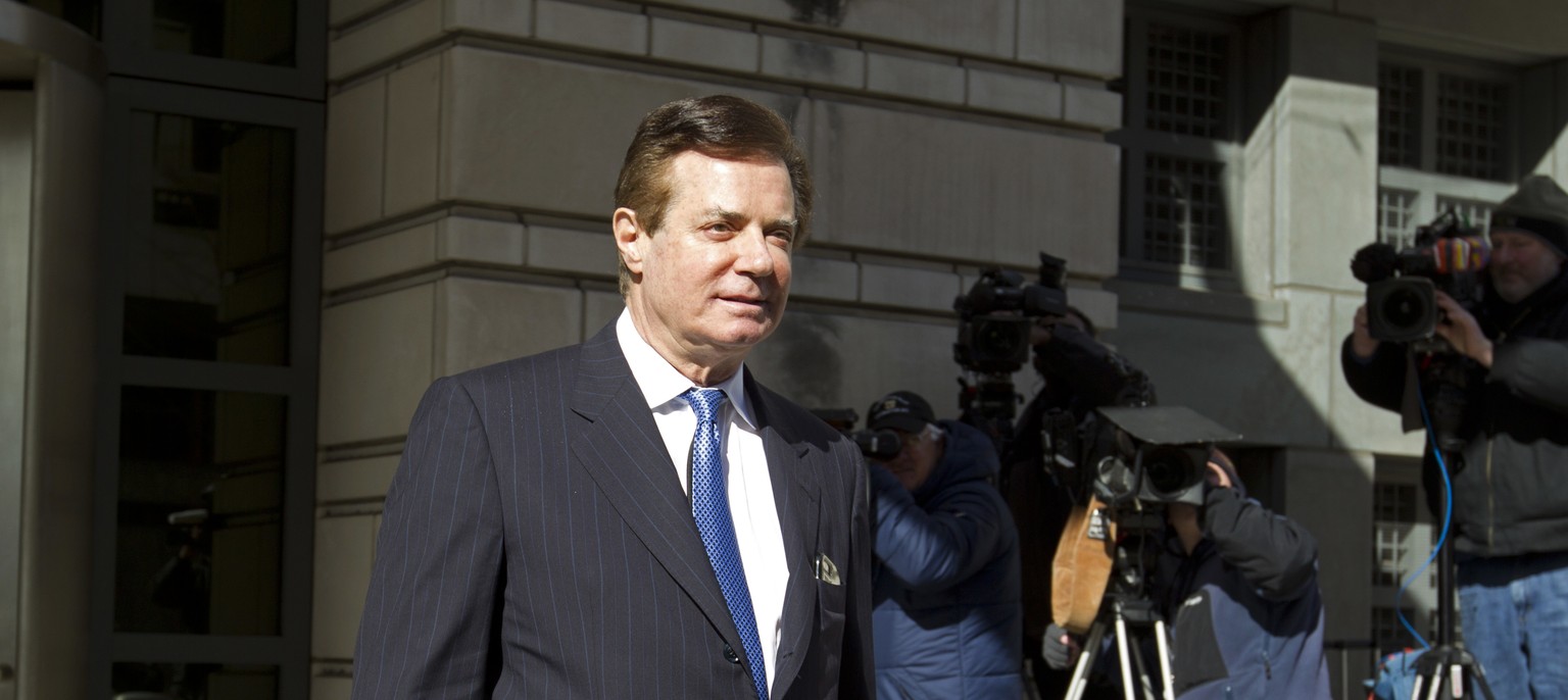 Paul Manafort, President Donald Trump&#039;s former campaign chairman, leaves the federal courthouse after his hearing, Wednesday, Feb. 28, 2018, in Washington. (AP Photo/Jose Luis Magana)