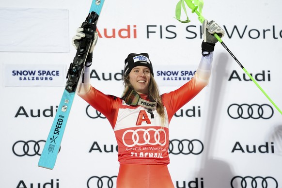 Switzerland&#039;s Camille Rast celebrates winning an alpine ski, women&#039;s World Cup slalom in Flachau, Austria, Tuesday, Jan.14, 2025. (AP Photo/Giovanni Auletta)
