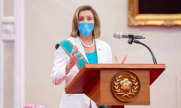 epa10103538 A handout photo made available by the Taiwan Presidential office shows US House Speaker Nancy Pelosi delivering her speech during her meeting with Taiwan President Tsai Ing-wen (not pictur ...