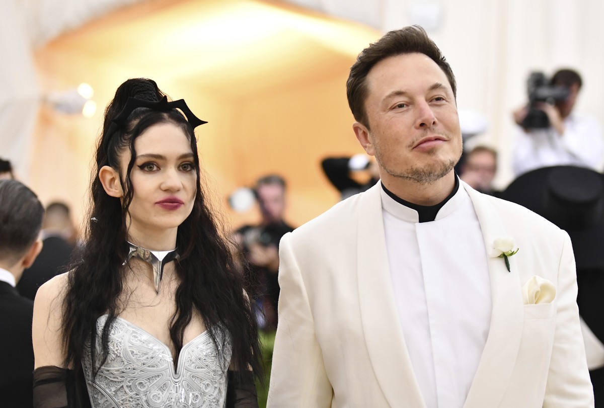 Grimes, left, and Elon Musk attend The Metropolitan Museum of Art's Costume Institute benefit gala celebrating the opening of the Heavenly Bodies: Fashion and the Catholic Imagination exhibition  ...