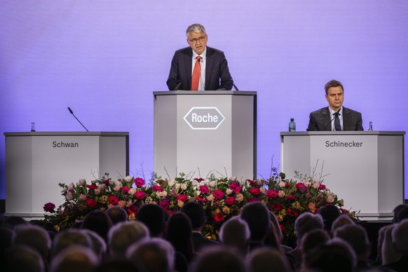KEYPIX - Chairman of the Board Severin Schwan, left, Thomas Schinecker, CEO Roche Group, attend the Annual General Meeting in Basel, Switzerland, on Tuesday, March 25, 2025. (KEYSTONE/Georgios Kefalas ...