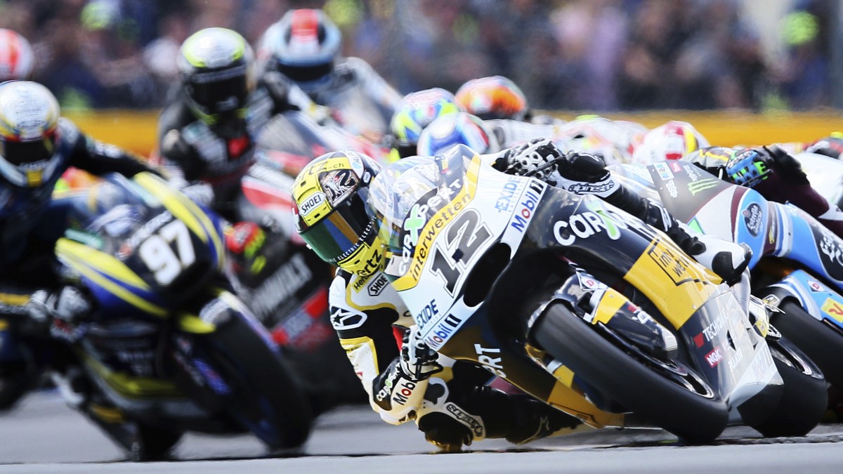 Moto2 rider Thomas Luthi of Switzerland leads the pack at the beginning of the French Grand Prix's race, in Le Mans, western France, Sunday, May 21, 2017. (AP Photo/David Vincent)