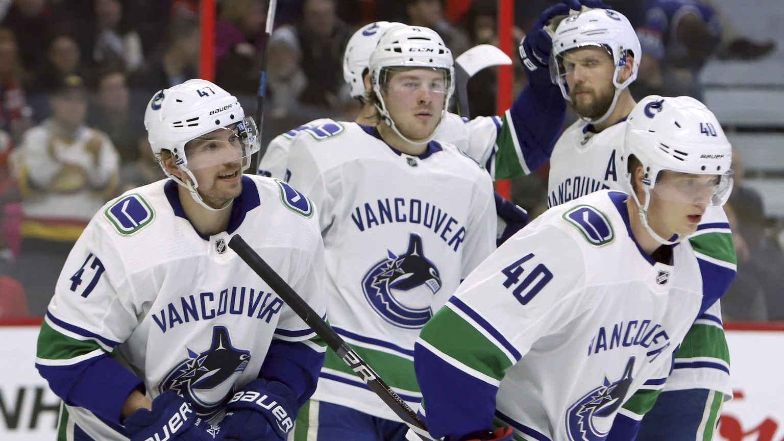 Vancouver Canucks&#039; Sven Baertschi (47) celebrates his goal against the Ottawa Senators with teammates during the second period of an NHL hockey game Wednesday, Jan. 2, 2019, in Ottawa, Ontario. ( ...