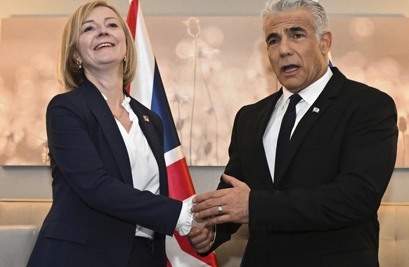 British Prime Minister Liz Truss and Israeli Prime Minister Yair Lapid hold a bilateral meeting as they attend the 77th U.N. General Assembly in New York, Wednesday, Sept. 21, 2022. (Toby Melville/Poo ...