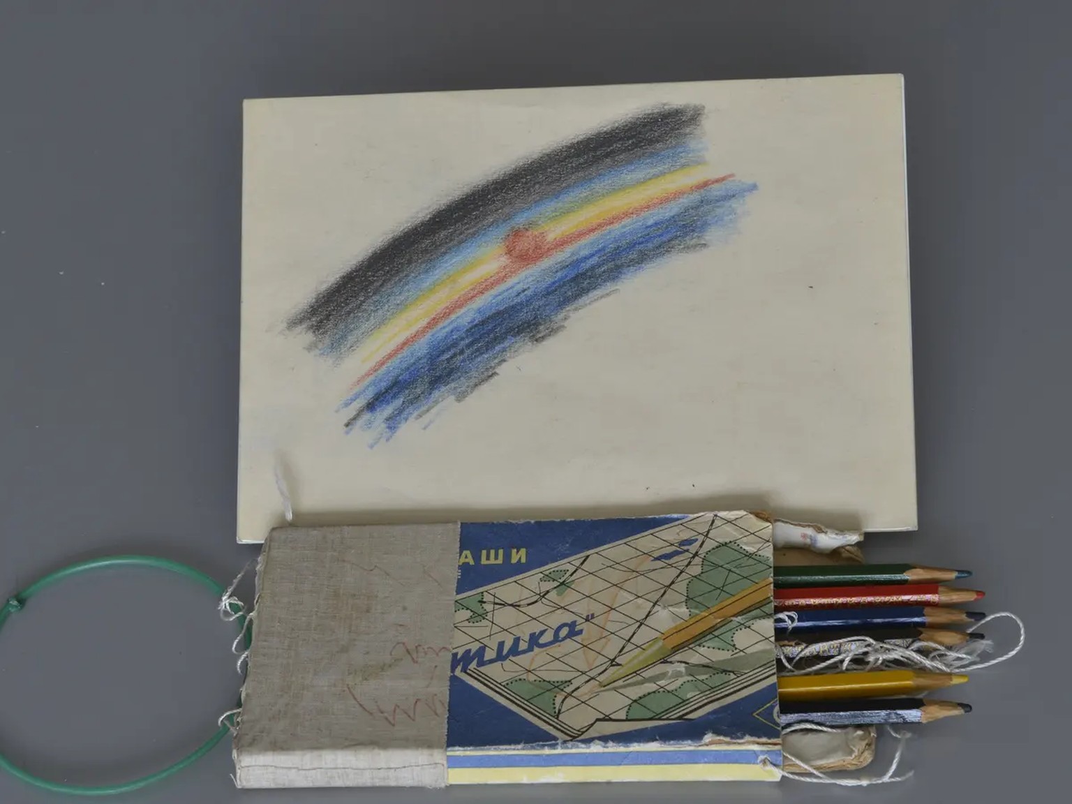 The first piece of art created in space, and the pencils Alexei Leonov used to draw it. Photograph: Museum of the Yuri Gagarin Cosmonaut Training Centre