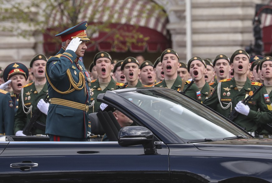 epa09935378 Russian Defense Minister Sergei Shoigu salutes Russian servicemen during the Victory Day military parade in the Red Square in Moscow, Russia, 09 May 2022. Russia marks Victory Day,