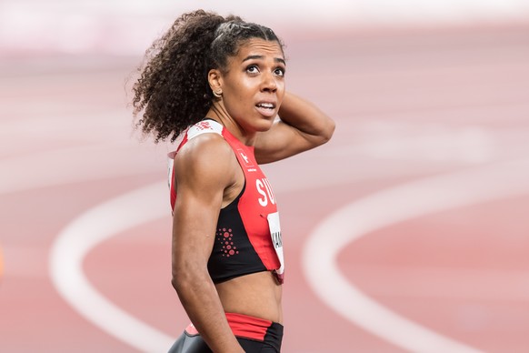 Mujinga Kambundji of Switzerland observes the scoreboard after finishing sixth in the final of the women&#039;s 100 m race at the 2020 Tokyo Summer Olympics Games in Tokyo, Japan, on Saturday, July 31 ...