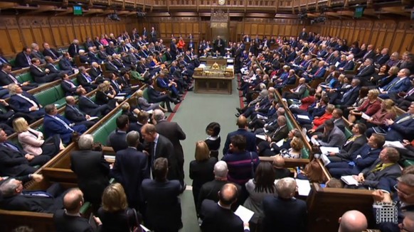 epa07938661 A grab from a handout video made available by the UK Parliamentary Recording Unit shows a general view over the House of Commons after Speaker of the House of Commons John Bercow addressed ...