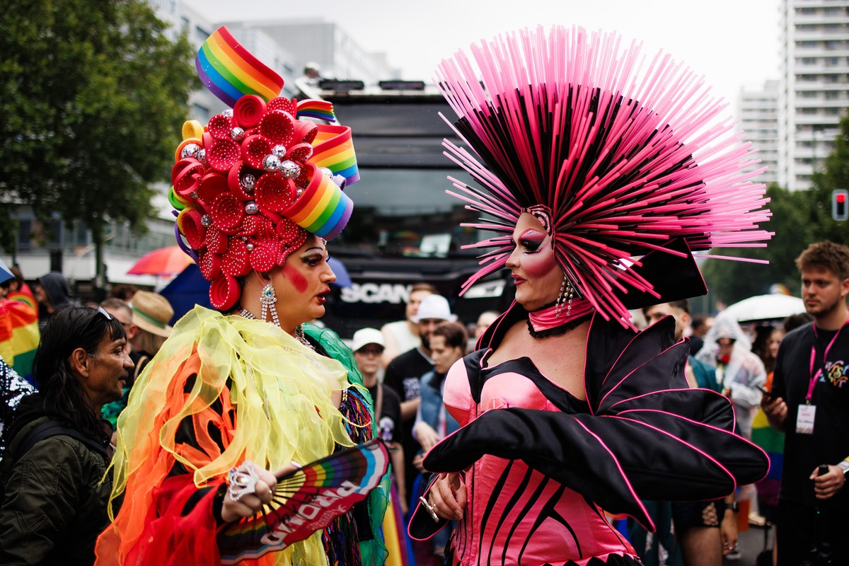 epa11499244 Participant Tatjana Taft (R) talks to another participant during the 'CSD Berlin 2024' the 46th Christopher Street Day parade in Berlin, Germany, 27 July 2024. CSD is an annual E ...