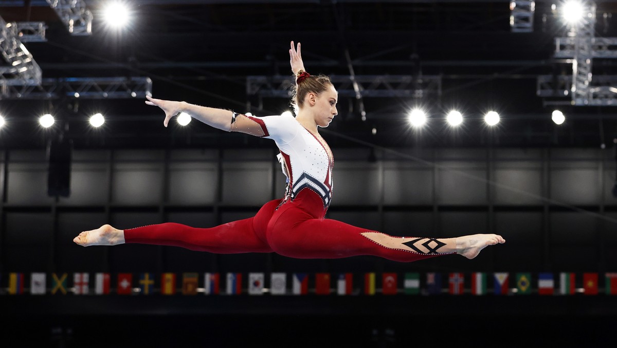 epa09365010 Sarah Voss of Germany competes on the Balance Beam during the Women's Qualification of the Tokyo 2020 Olympic Games Artistic Gymnastics events at the Ariake Gymnastics Centre in Tokyo ...