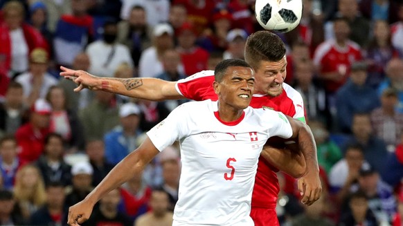 epa06831879 Sergej Milinkovic-Savic of Serbia and Manuel Akanji of Switzerland (L) in action during the FIFA World Cup 2018 group E preliminary round soccer match between Serbia and Switzerland in Kal ...