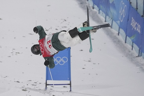 Switzerland&#039;s Marco Tade competes in the men&#039;s moguls qualifying at Genting Snow Park at the 2022 Winter Olympics, Thursday, Feb. 3, 2022, in Zhangjiakou, China. (AP Photo/Gregory Bull)