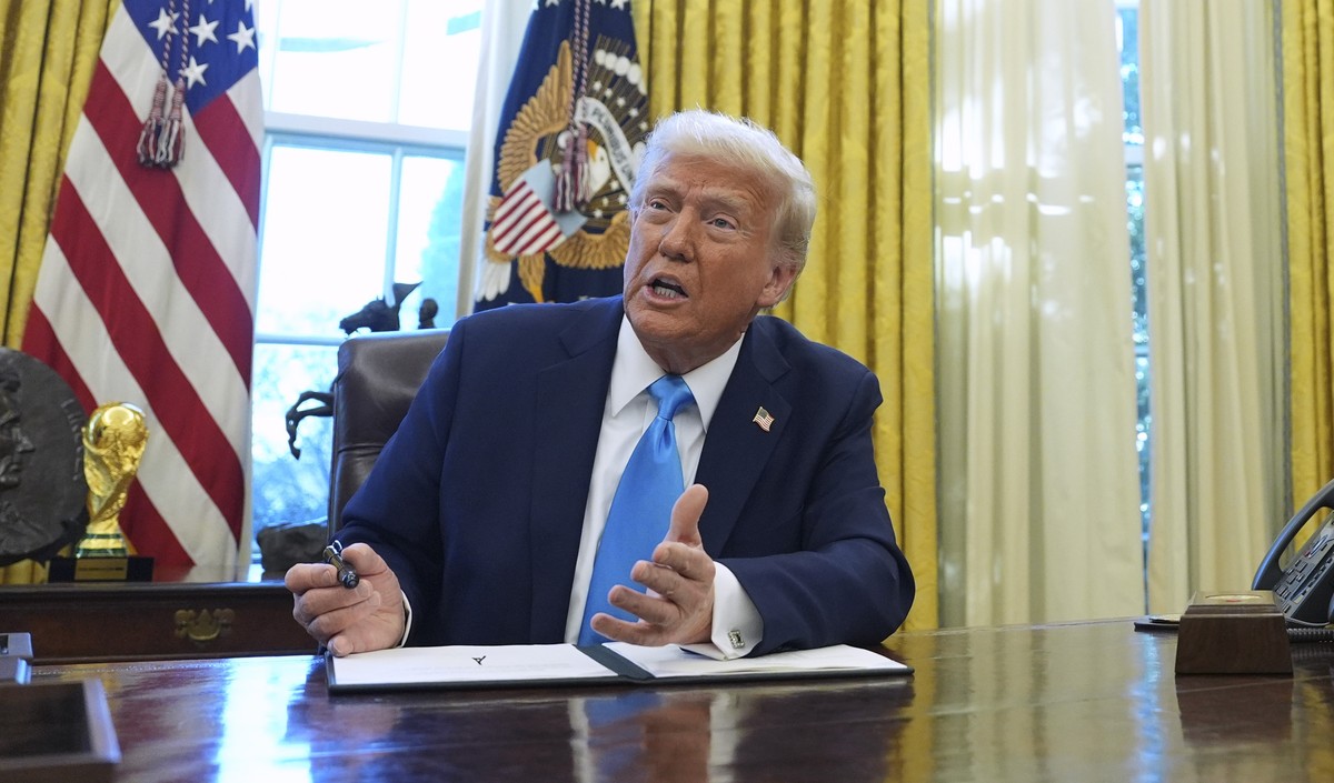 FILE - President Donald Trump speaks to reporters as he signs executive orders in the White House on Tuesday, Feb. 4, 2025, in Washington. (AP Photo/Evan Vucci, File)
Donald Trump