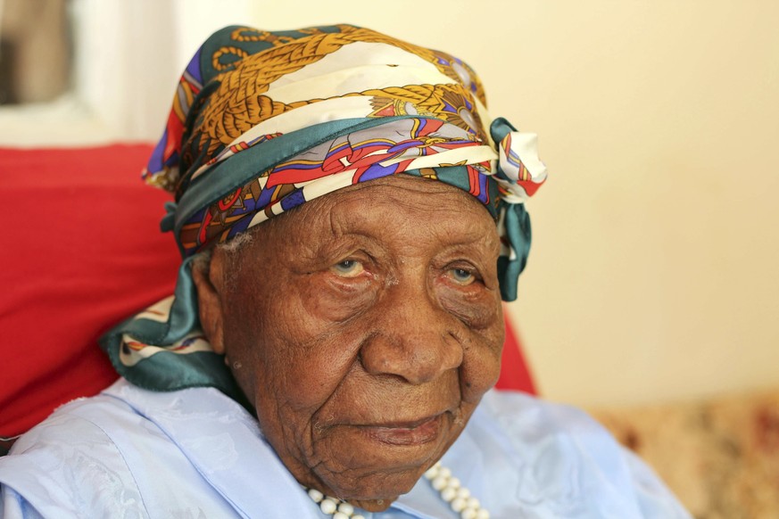 The world&#039;s oldest person Violet Brown poses for a photo at her home in Duanvale, Jamaica, Sunday, April 16, 2017. The 117-year-old woman living in the hills of western Jamaica is believed to hav ...