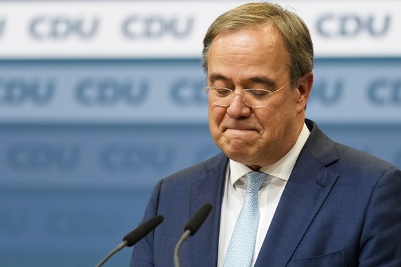 Christian Democratic Union party chairman Armin Laschet speaks to media at the party&#039;s headquarters in Berlin, Thursday, Oct. 7, 2021. (AP Photo/Markus Schreiber)