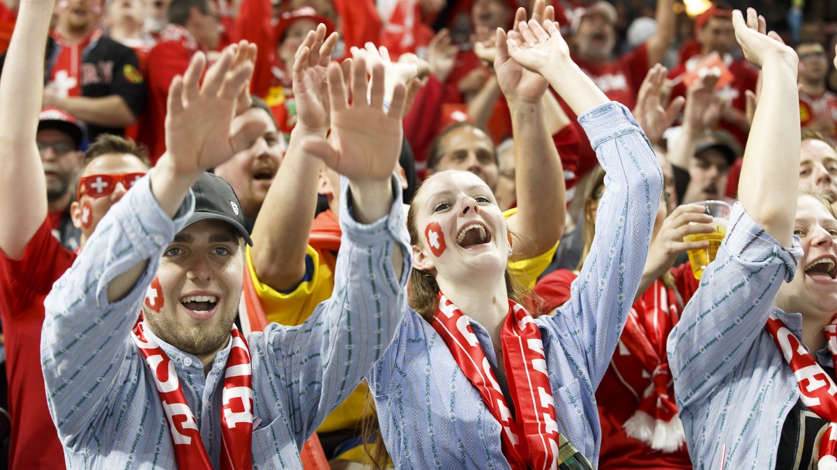 Switzerland's supporters cheer their team, during the IIHF 2018 World Championship preliminary round game between Slovakia and Switzerland, at the Royal Arena, in Copenhagen, Denmark, Sunday, May ...