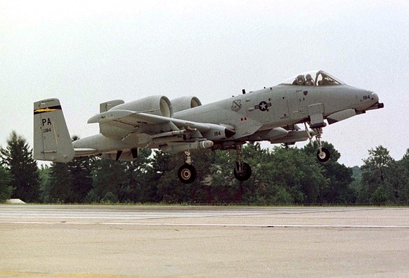 ** FILE ** A-10 Warthog lands at the WIllow Grove Naval Air Station in Willow Grove, Pa., in this Aug. 28, 1998 file photo. A similar U.S Air force plane crashed during a training mission in a forest  ...
