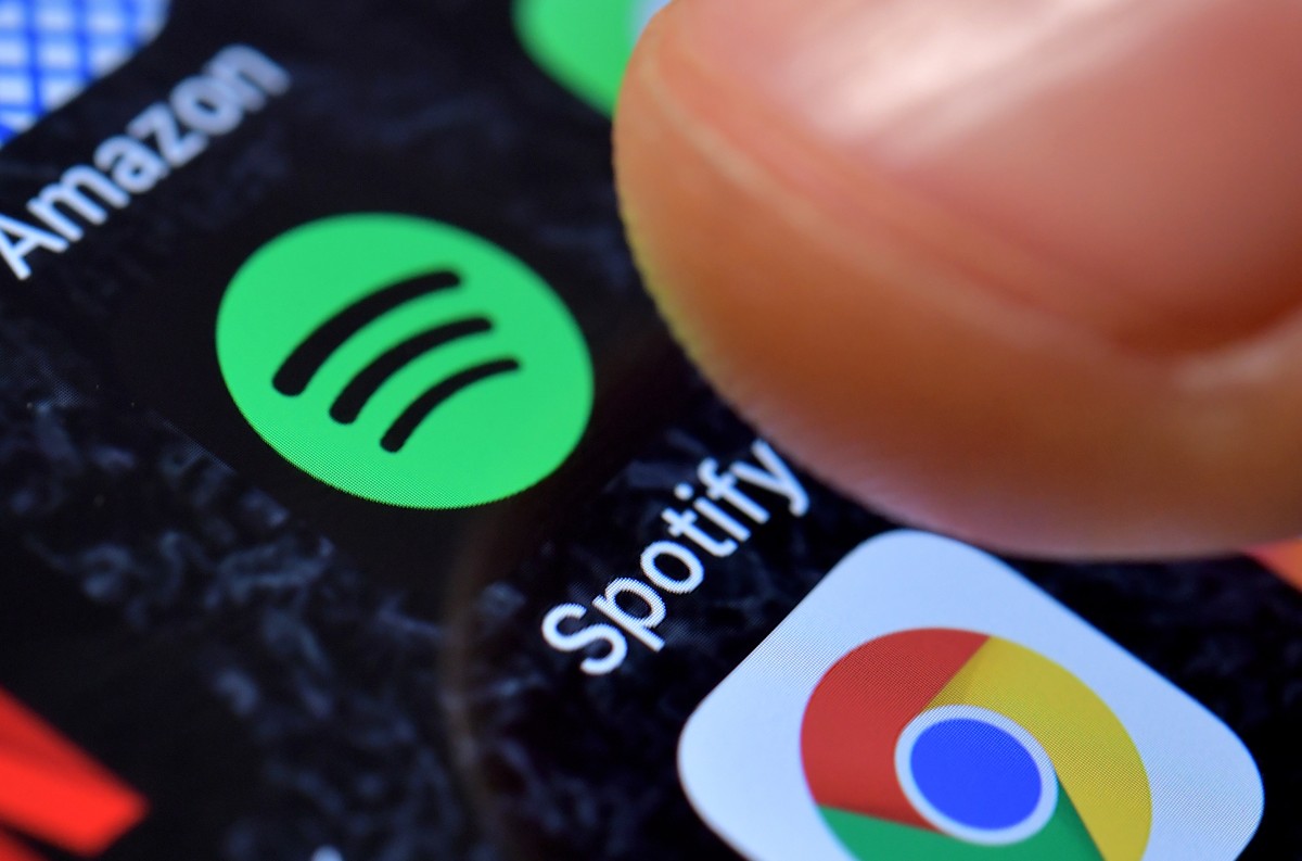 epa09044615 (FILE) - A close-up image showing the Spotify Music app on an iPhone in Kaarst, Germany, 08 November 2017 (reissued 01 March 2021). Spotify confirmed on 01 March 2021 it had removed hundre ...