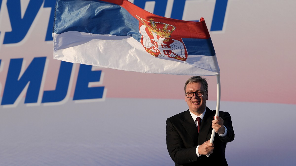 FILE - Serbian President Aleksandar Vucic waves a Serbian flag during a rally of the ruling Serbian Progressive Party (SNS) in Belgrade, Serbia, on June 27, 2026. (AP Photo/Darko Vojinovic, File)
Alek ...
