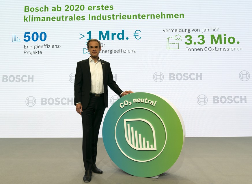 epa07557250 Volkmar Denner, Chief Executive Officer (CEO) of Robert Bosch GmbH, poses next to a Logo of CO2 before the annual press conference in Renningen, Germany, 09 May 2019. World&#039;s largest  ...