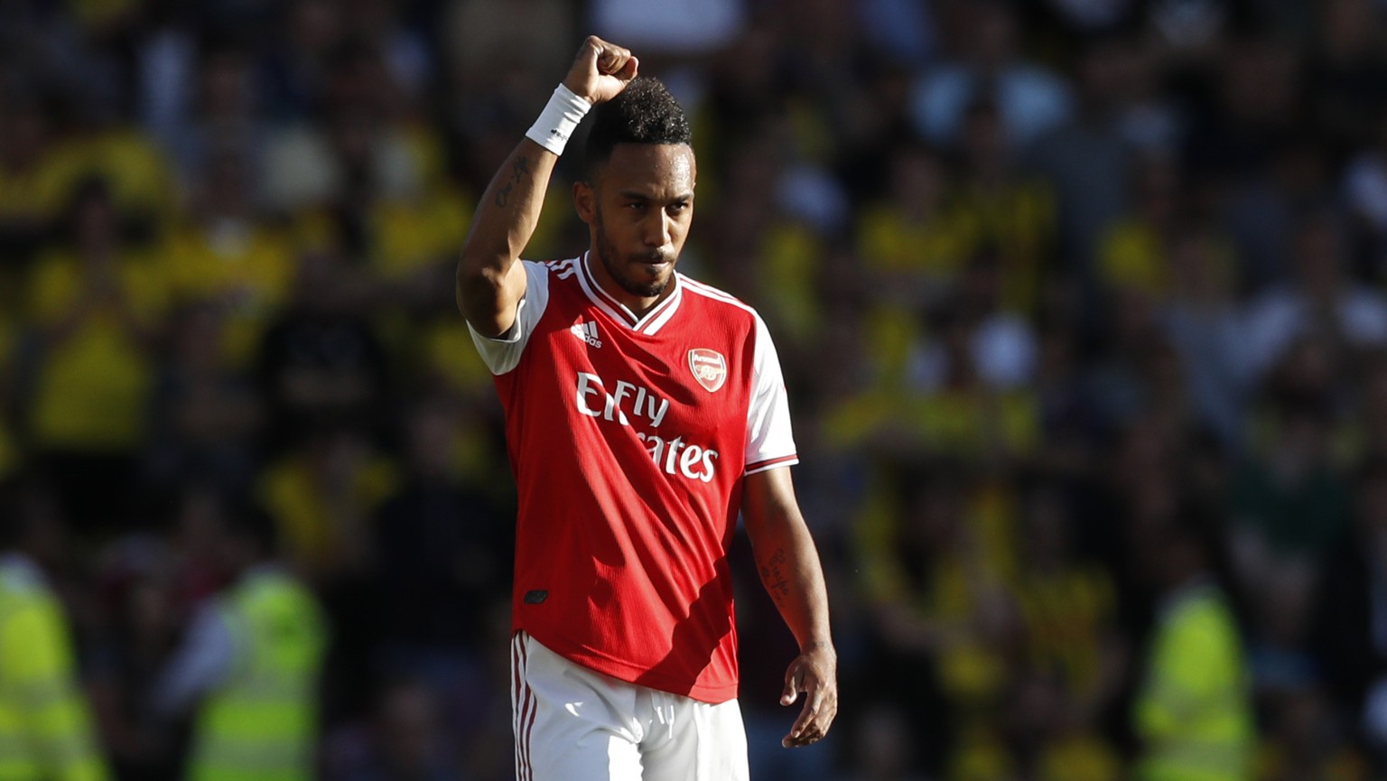 Arsenal&#039;s Pierre-Emerick Aubameyang celebrates after he scores the opening goal of the game during theEnglish Premier League soccer match between Watford and Arsenal at the Vicarage Road stadium  ...