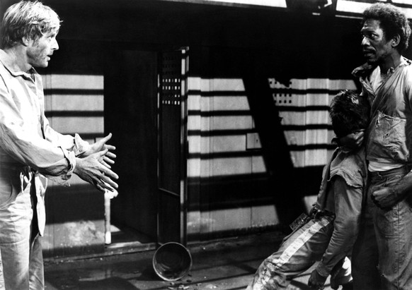 BRUBAKER, from left, Robert Redford, Morgan Freeman, 1980. TM &amp; Copyright 20th Century Fox Film Corp./courtesy Everett Collection Ref:MBDBRUB FE018 PUBLICATIONxINxGERxSUIxAUTxONLY Copyright: xx MB ...