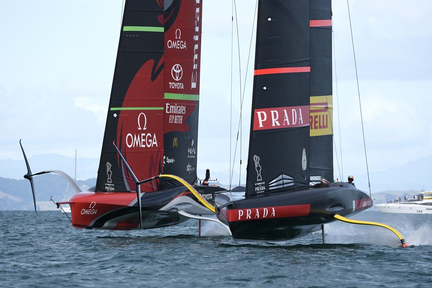 Italy&#039;s Luna Rossa, right, races Emirates Team New Zealand in race eight of the America&#039;s Cup on Auckland&#039;s Waitemata Harbour, Monday, March 15, 2021. (Chris Cameron/Photosport via AP)