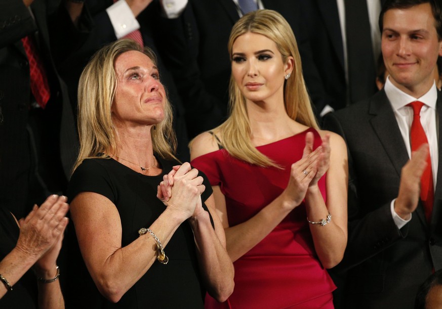 U.S. President Trump Addresses Joint Session of Congress - Washington, U.S. - 28/02/17 - Carryn Owens (L), widow of Senior Chief Petty Officer William &quot;Ryan&quot; Owens, reacts as Ivanka Trump, d ...