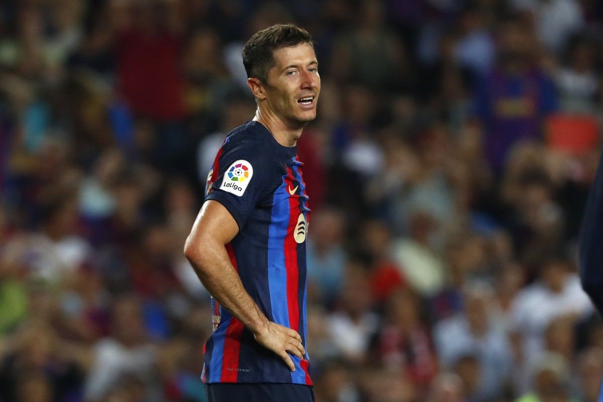 Barcelona's Robert Lewandowski reacts during a Spanish La Liga soccer match between Barcelona and Rayo Vallecano at the Camp Nou stadium in Barcelona, Spain, Saturday, Aug. 13, 2022. (AP Photo/Jo ...