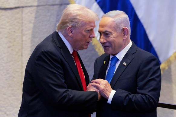 FILE - President Donald Trump talks with Israel&#039;s Prime Minister Benjamin Netanyahu at the Knesset, Israel&#039;s parliament, Monday, Oct. 13, 2025, in Jerusalem. (Chip Somodevilla/Pool via AP, f ...