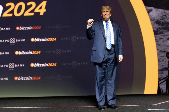 FILE - Republican presidential candidate former President Donald Trump arrives to speak at the Bitcoin 2024 conference, Saturday, July 27, 2024, in Nashville, Tenn. (AP Photo/Alex Brandon, File)
Donal ...