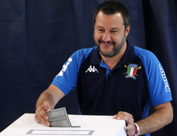 Italian Interior Minister and Deputy Premier Matteo Salvini, of the League, casts his ballot for the European Parliament elections, at a polling station in Milan, Italy, Sunday, May 26, 2019. Pivotal  ...