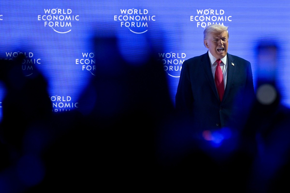 President Donald Trump walks on to the stage during the 56th annual meeting of the World Economic Forum, WEF, in Davos, Switzerland, Wednesday, Jan. 21, 2026. (Gian Ehrenzeller/Keystone via AP)