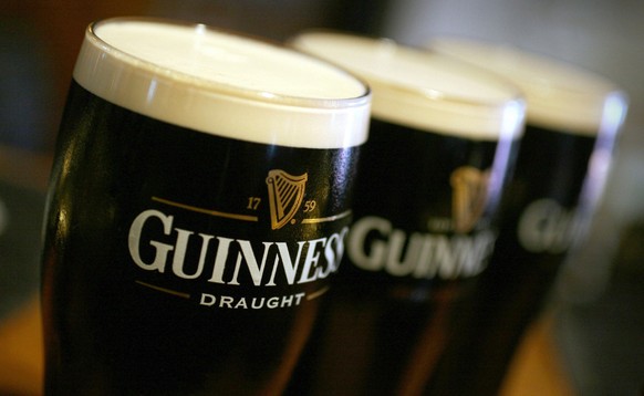 Pints of Guinness beer sit on the bar at the Bell public house in Wendens Ambo, Essex, UK, Wednesday, Aug. 29, 2007. Diageo Plc, the world&#039;s largest liquor maker, reported slowing profit growth a ...