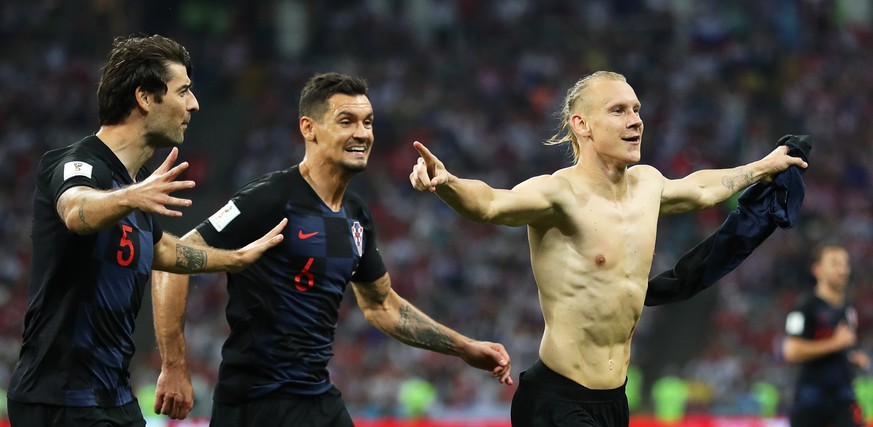 epa06872679 Domagoj Vida (R) of Croatia celebrates with his teammates after scoring the 2-1 lead during the FIFA World Cup 2018 quarter final soccer match between Russia and Croatia in Sochi, Russia,  ...