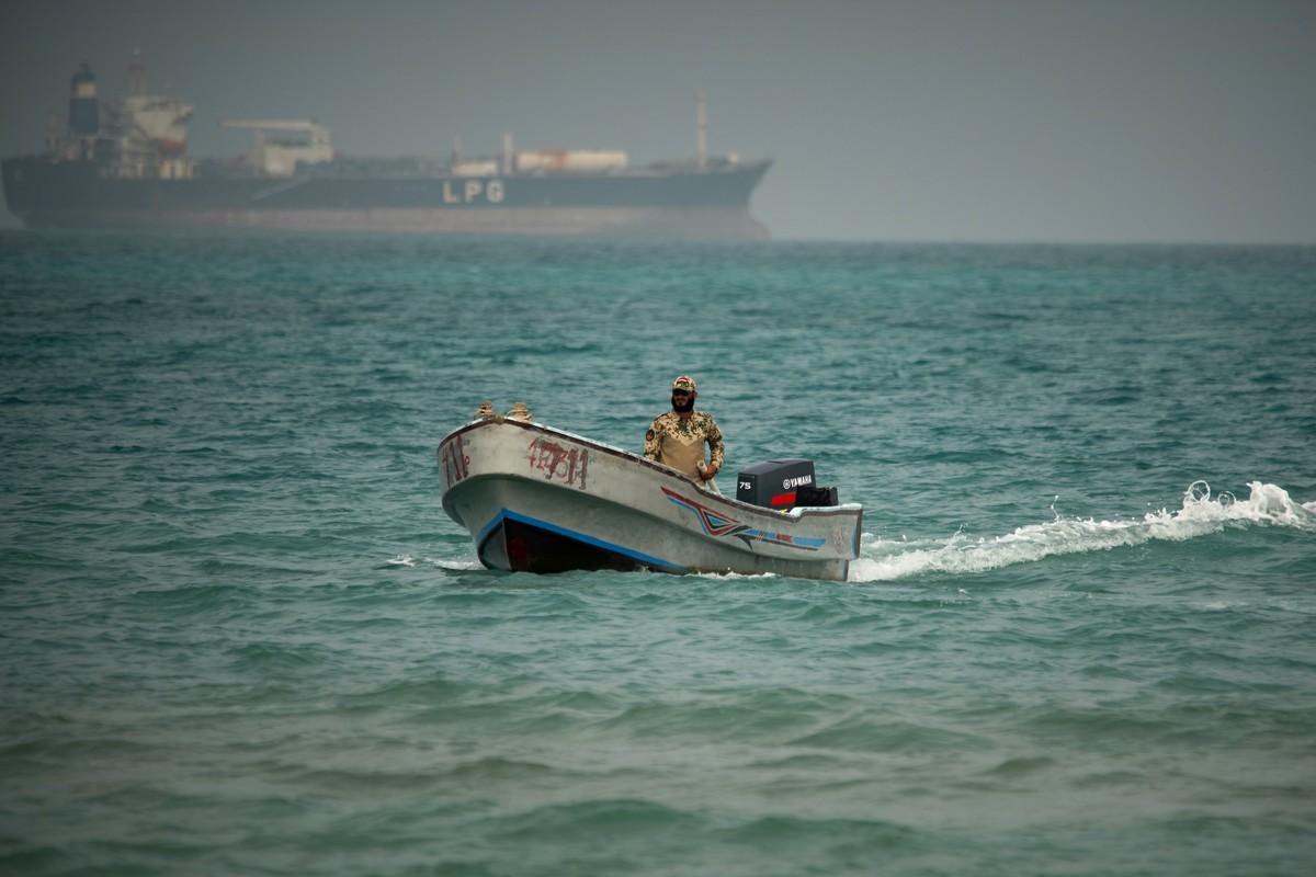Backdropped by an LPG (liquefied petroleum gas) tanker, a Yemeni soldier saisl in waters north of the Bab el-Mandeb Strait in Mokha, Yemen, Monday, April 6, 2026. (AP Photo/Abdulnasser Alseddik)
Yemen ...