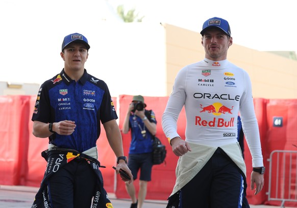 epa12726438 Red Bull Racing driver Max Verstappen (R) of Netherlands and his teammate Isack Hadjar of France walk ahead of Formula 1 pre-season testing at Bahrain International Circuit in Sakhir, Bahr ...