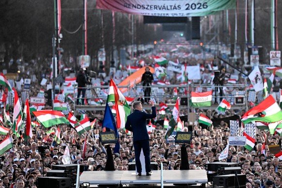 Opposition leader Peter Magyar, center, addresses his supporters during a march in Budapest, Sunday, March 15, 2026. (AP Photo/Denes Erdos)
Peter Magyar