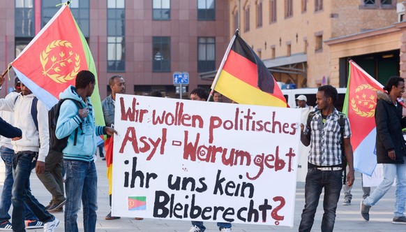 Auch in Deutschland läuft die Kontroverse: Eritreer fordern in Berlin die Anerkennung als politische Flüchtlinge.<br data-editable="remove">