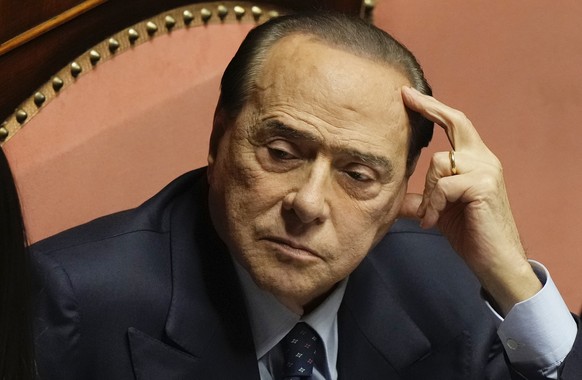 FILE - Forza Italia party leader Silvio Berlusconi at he Senate, in Rome, on Oct. 26, 2022. Former Premier Silvio Berlusconi was found not guilty Wednesday, Feb. 15, 2023, of witness tampering in the  ...