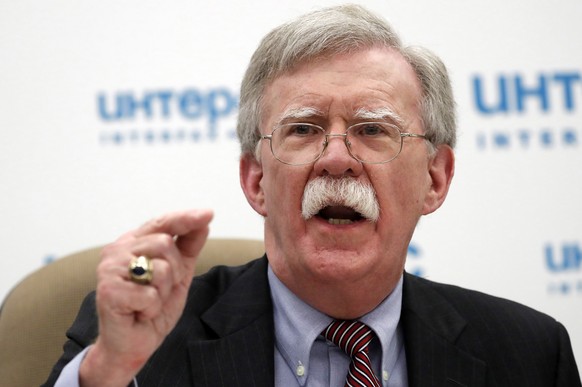 epa07114121 US National Security Adviser John Bolton speaks during a press conference in Interfax News agency in Moscow, Russia, 23 October 2018. John Bolton arrived in Moscow on a three-days visit to ...