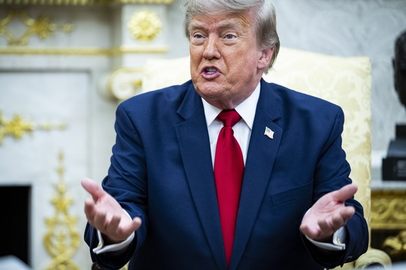 epa13111144 US President Donald Trump speaks with Iraqi Prime Minister Ali al-Zaidi (not pictured) during their meeting in the Oval Office of the White House in Washington, DC, USA, 14 July 2026. This ...