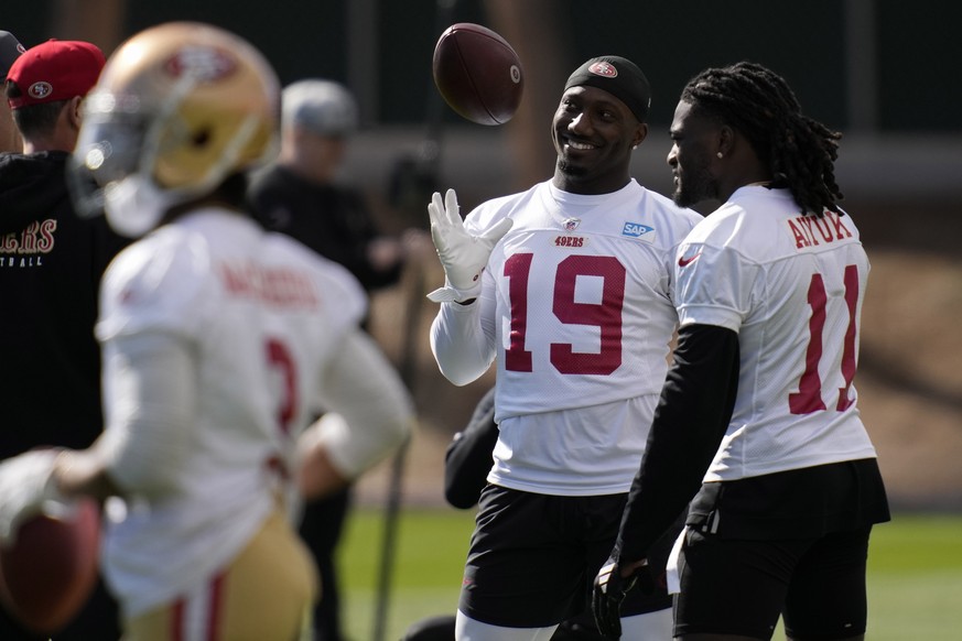 San Francisco 49ers wide receiver Deebo Samuel (19) jokes with wide receiver Brandon Aiyuk (11) during practice ahead of the Super Bowl 58 NFL football game Wednesday, Feb. 7, 2024, in Las Vegas. The  ...