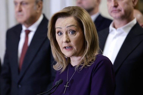 epa11756322 Save Romania Union (USR) party leader and run-off presidential candidate Elena Lasconi speaks during a press conference following her meeting with business community leaders ahead of the c ...