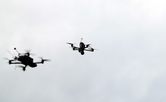 epa12995682 Latvian Eraser drones are displayed during Innovation Range Demo Day at the Selija Military Training Area in Latvia, 26 May 2026. The NATO Innovation Range Demonstration Day showcased new  ...