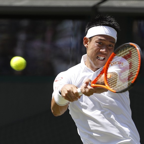 Japan&#039;s Kei Nishikori returns to Ukraine&#039;s Sergiy Stakhovsky during their Men&#039;s Singles Match on day three at the Wimbledon Tennis Championships in London Wednesday, July 5, 2017. (AP P ...