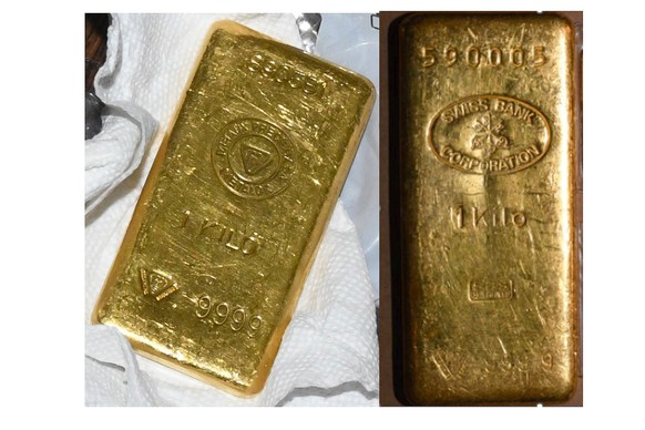 This image provided by the U.S. Attorney's Office, Friday, Sept. 22, 2023, in New York, shows two of the gold bars found during a search by federal agents of the home and security of Senator Bob Menendez.