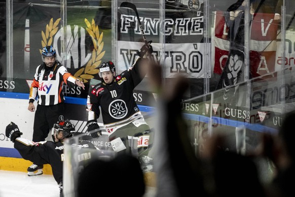 Marco Mueller (HCL) celebrate 4-3 goal, during the regular season of National League Swiss Championship 2024/25 between HC Lugano and SC Bern at the ice stadium Corner Arena, Switzerland, Tuesday, Sep ...