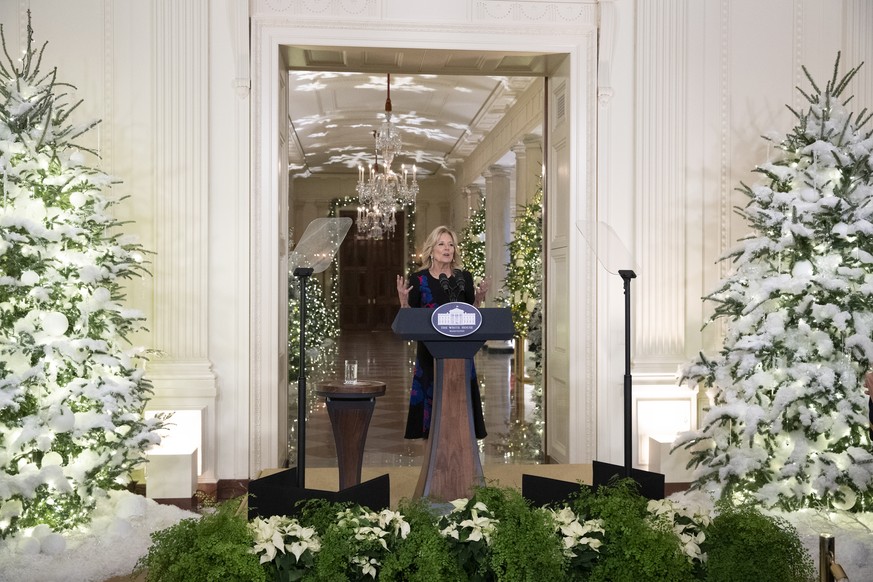epa10334963 US First Lady Jill Biden delivers remarks thanking volunteers from across the country who helped decorate the White House for the 2022 season, in the East Room of the White House, in Washi ...